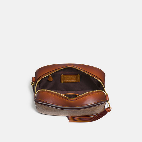 Coach camera bag store signature